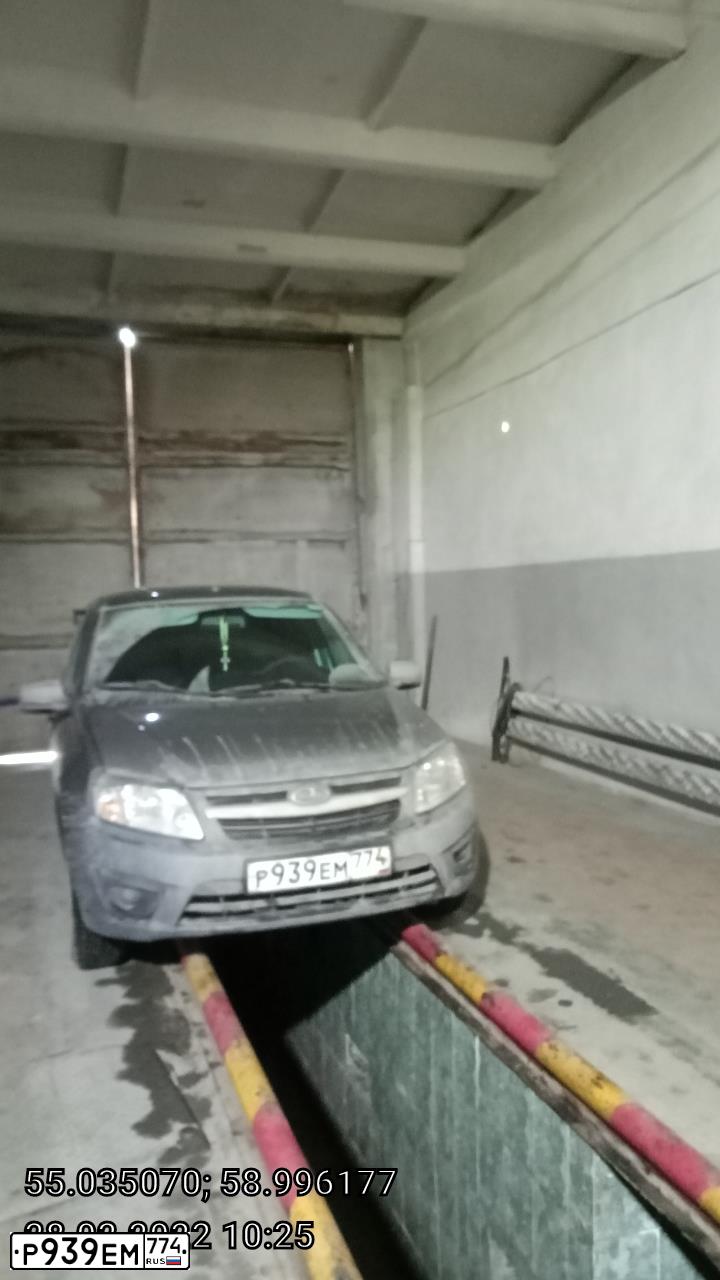 Фото автомобиля LADA 2190 GRANTA, 2014 — госномер Р939ЕМ774. Цвет: Серо-Синий