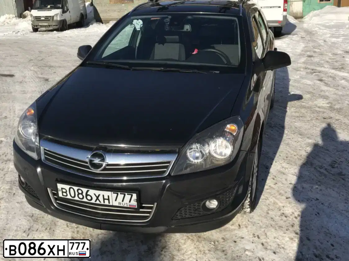Фото автомобиля OPEL ASTRA, 2011 — госномер А981ЕМ198. Цвет: ЧЕРНЫЙ