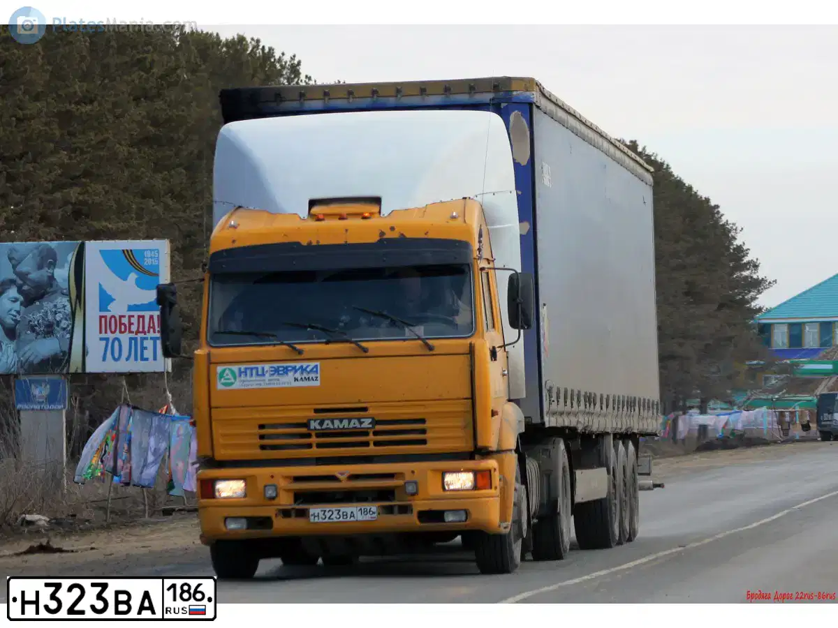 Фото автомобиля KAMAZ 5460 /4X2/, 2009 — госномер Н323ВА186. Цвет: ЖЕЛТЫЙ ГЕОРГИН