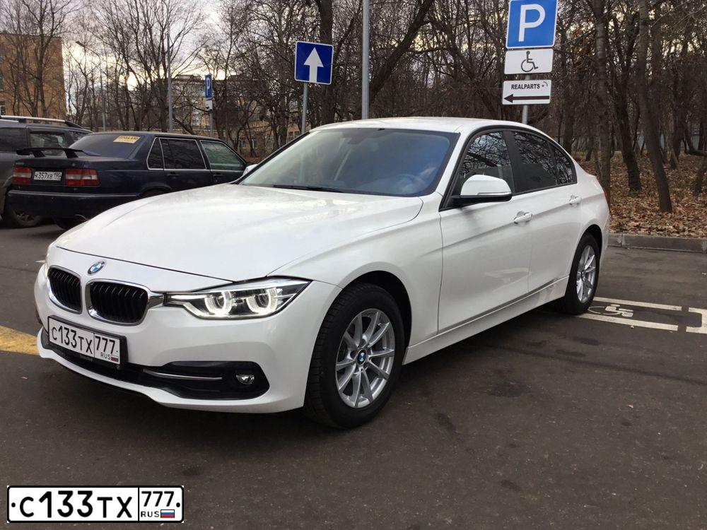 Фото автомобиля BMW SERIE 3, 2016 — госномер Р158АВ32. Цвет: Белый