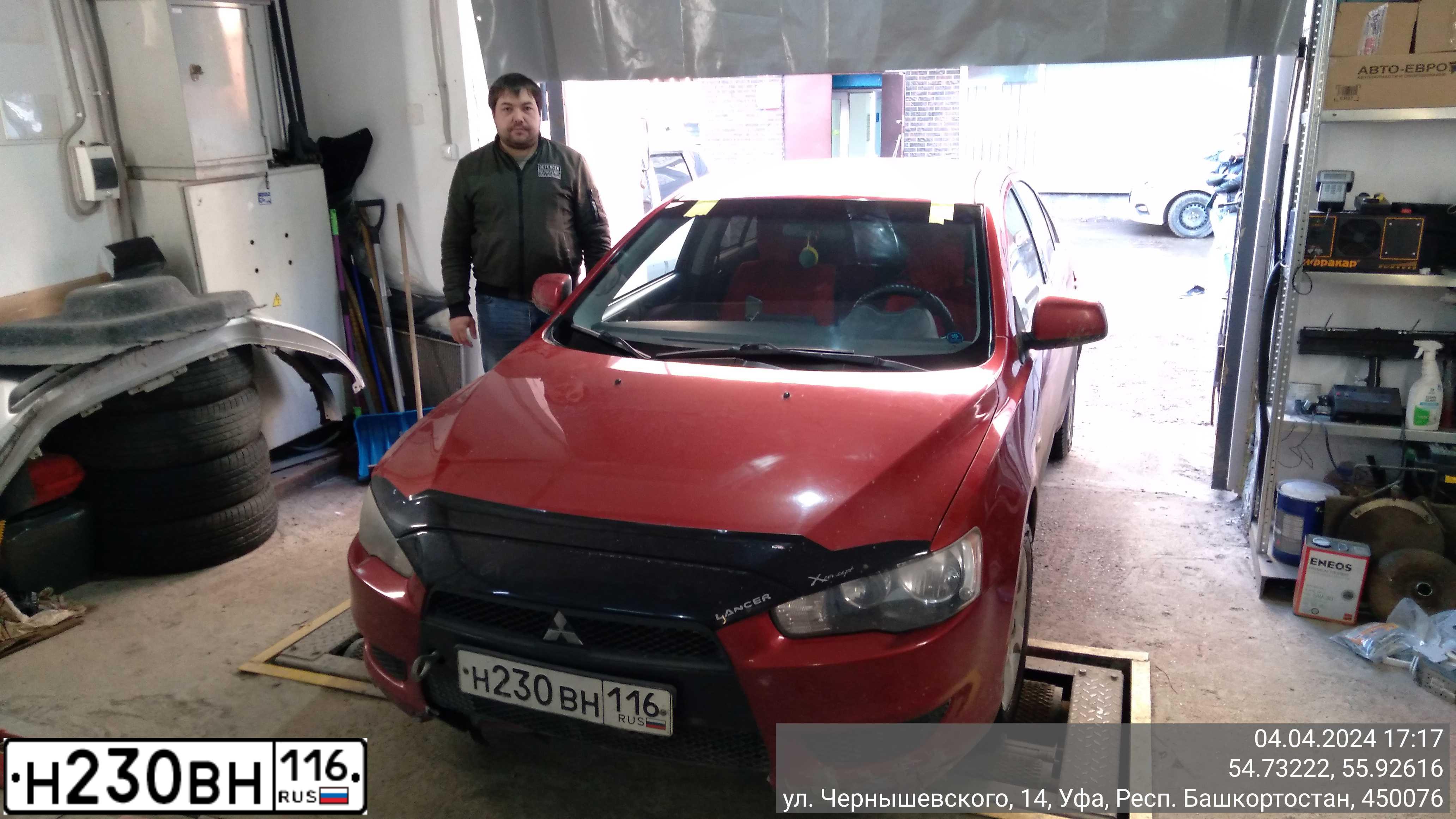 Фото автомобиля MITSUBISHI LANCER, 2010 — госномер Т262ВХ774. Цвет: Красный