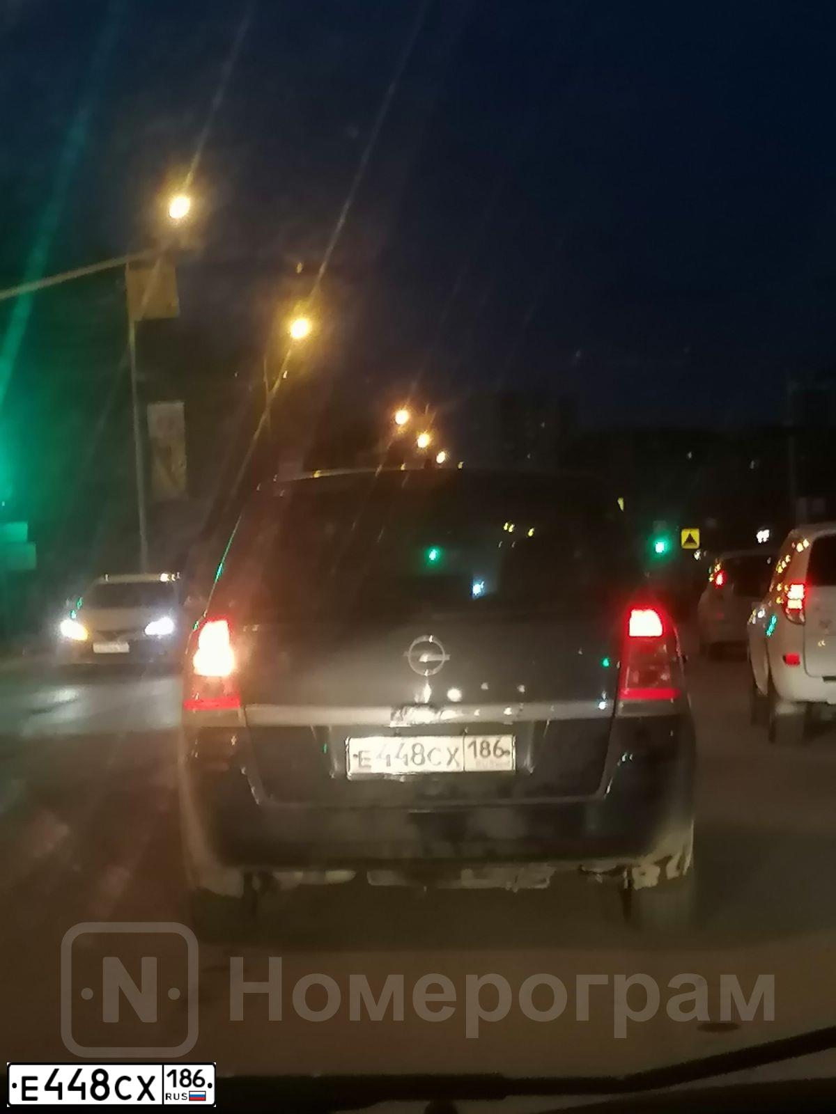 Фото автомобиля OPEL ZAFIRA, 2011 — госномер Е448СХ186. Цвет: синий