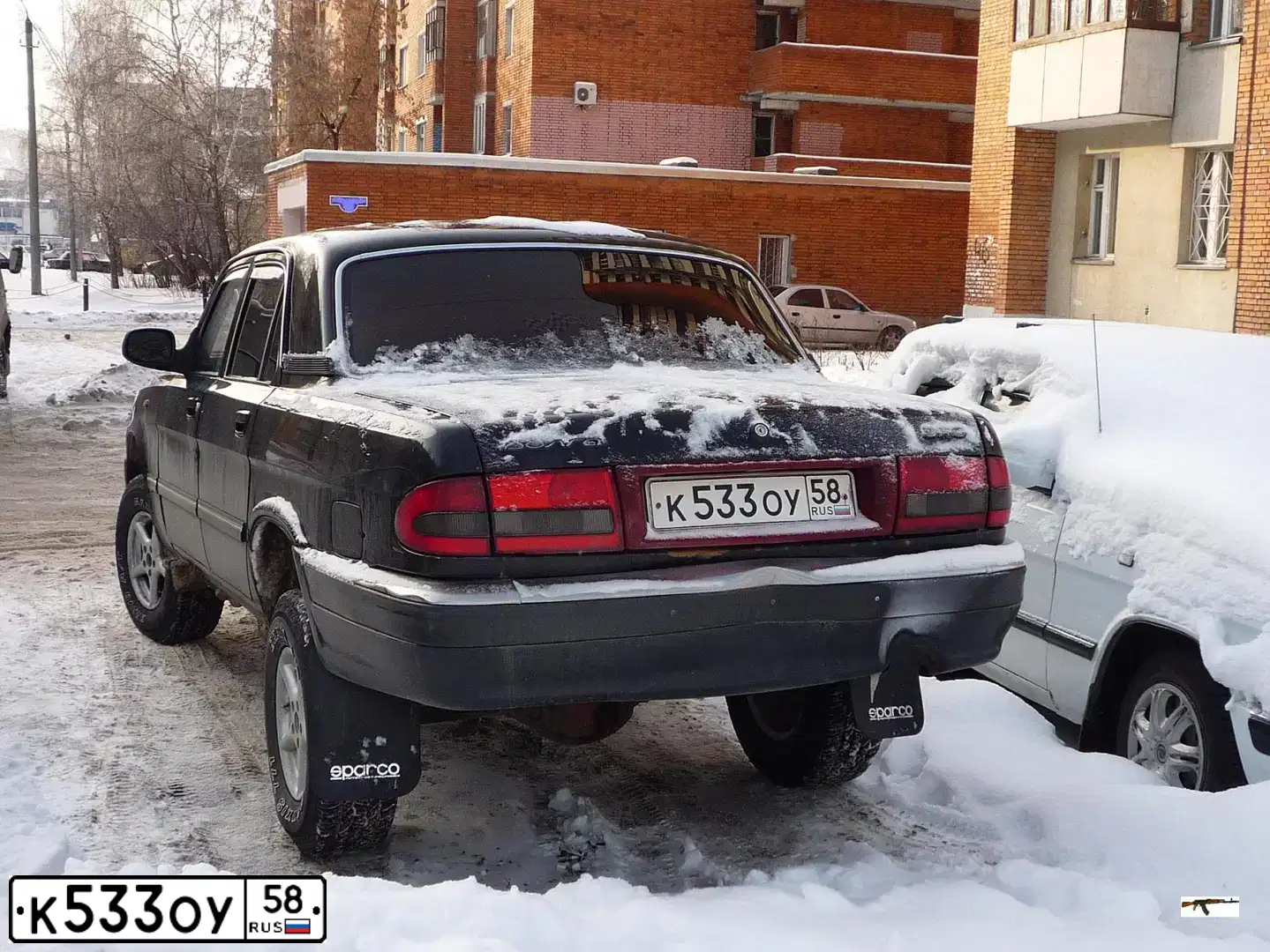 Фото автомобиля GAZ 3110 WOLGA, 2004 — госномер К533ОУ58. Цвет: ЧЕРНЫЙ
