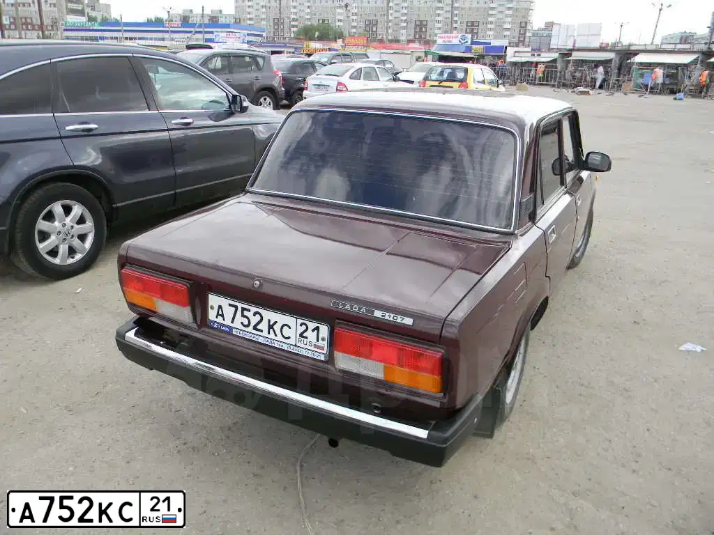Фото автомобиля LADA 2107, 2008 — госномер Н968ХХ154. Цвет: ТЕМНО - ВИШНЕВЫЙ