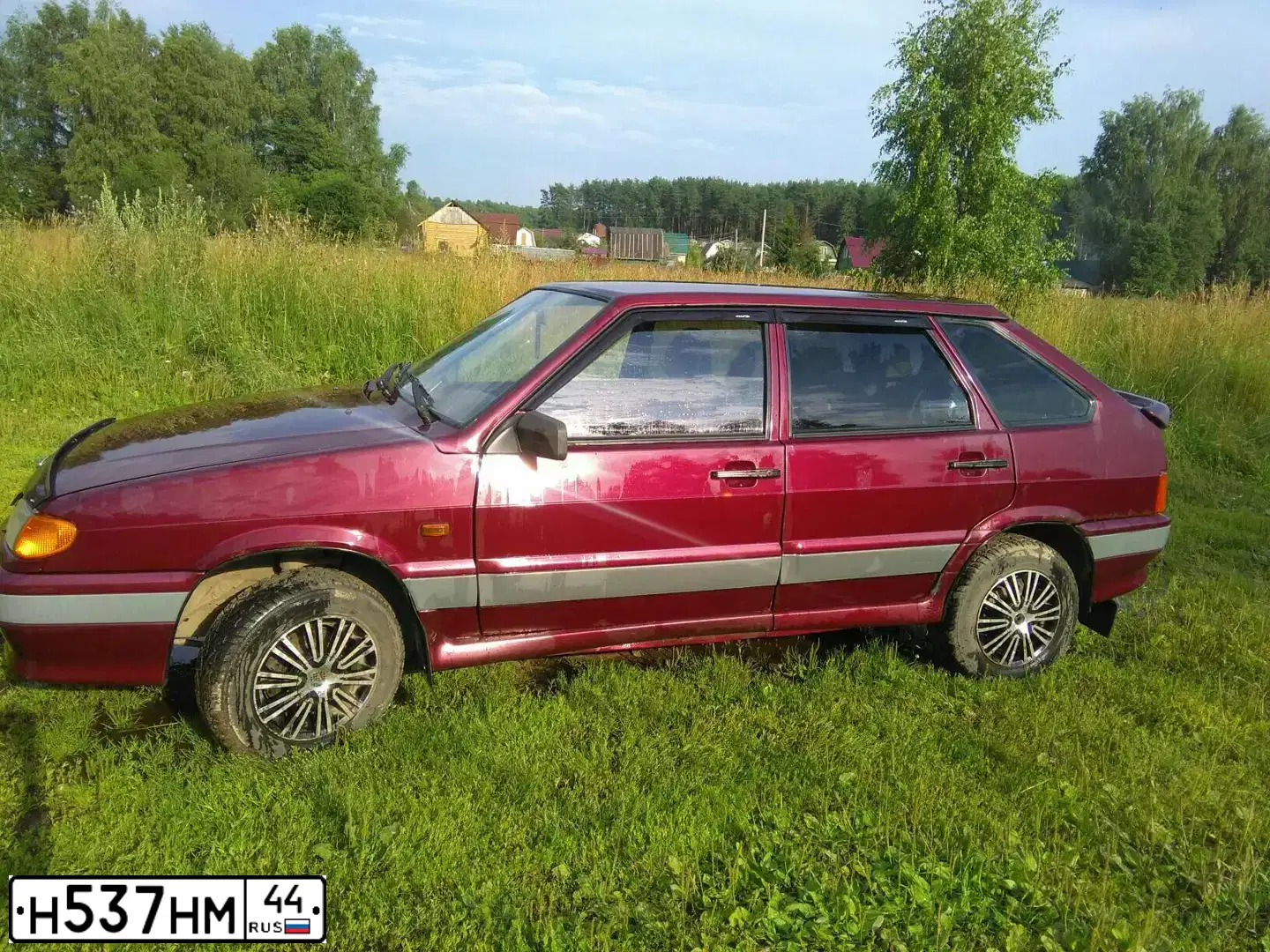 Фото автомобиля LADA 2114 SAMARA, 2005 — госномер Е715МУ761. Цвет: ТЕМНО-КРАСНЫЙ