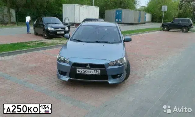 Фото автомобиля MITSUBISHI LANCER, 2008 — госномер С962ХК198. Цвет: СВЕТЛО-СЕРО-ЗЕЛЕНЫЙ