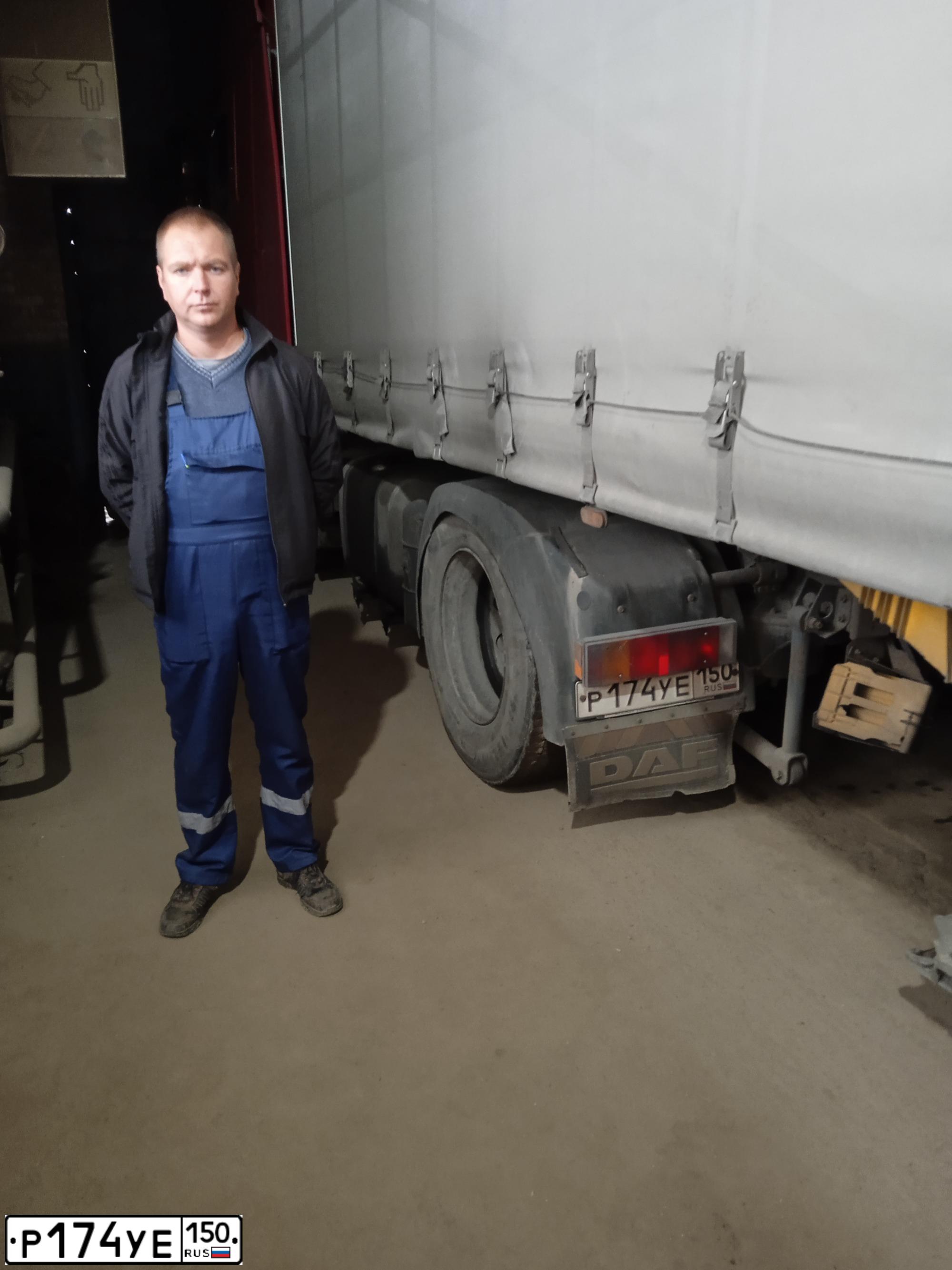 Фото автомобиля DAF XF 95 FT /4X2/, 2004 — госномер Р174УЕ150. Цвет: КРАСНЫЙ