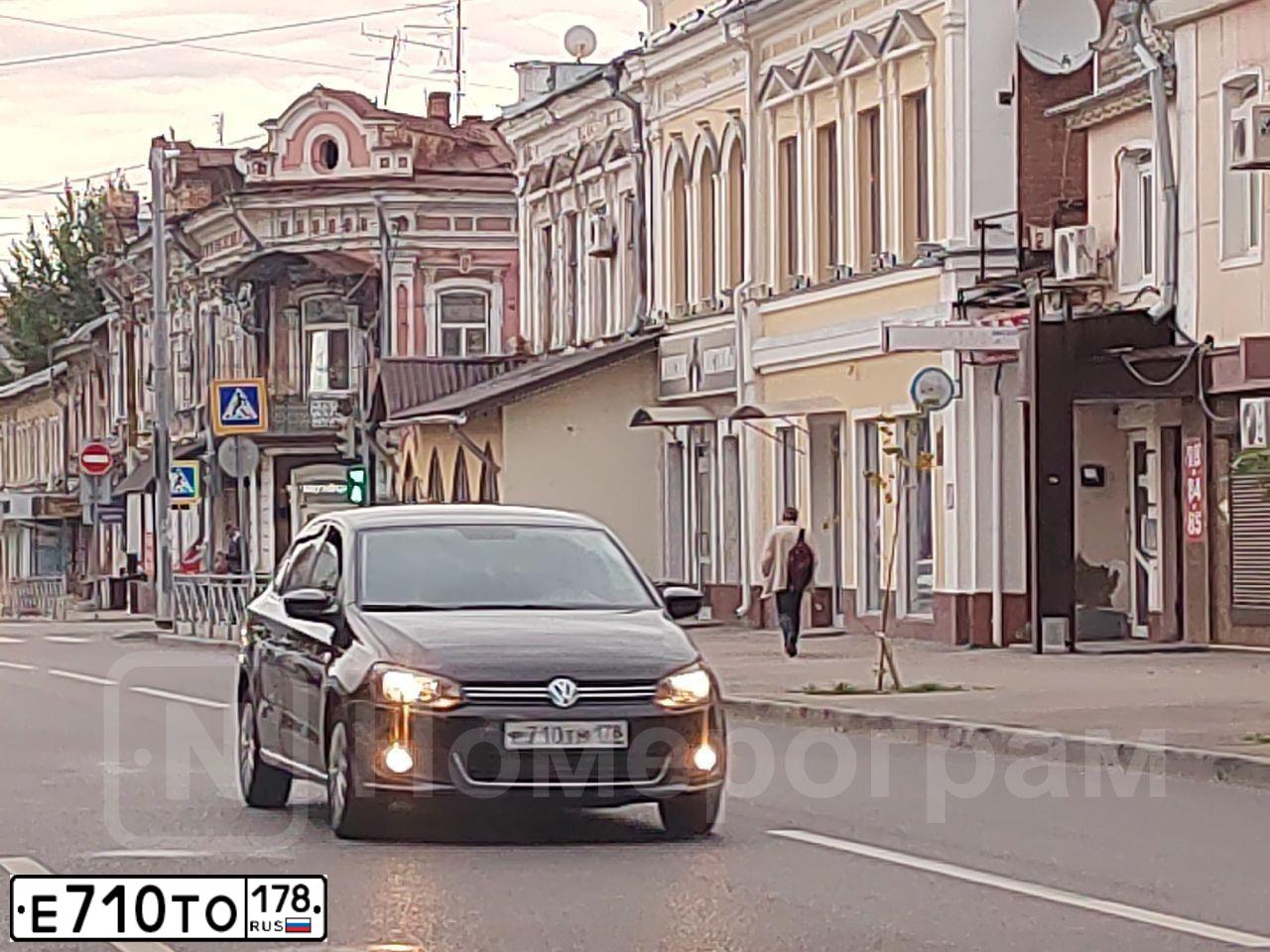 Фото автомобиля FORD FOCUS, 2011 — госномер Е710ТО178. Цвет: СЕРЕБРИСТЫЙ