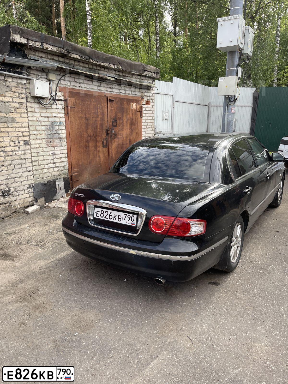 Фото автомобиля KIA OPIRUS, 2007 — госномер Е826КВ790. Цвет: ЧЕРНЫЙ
