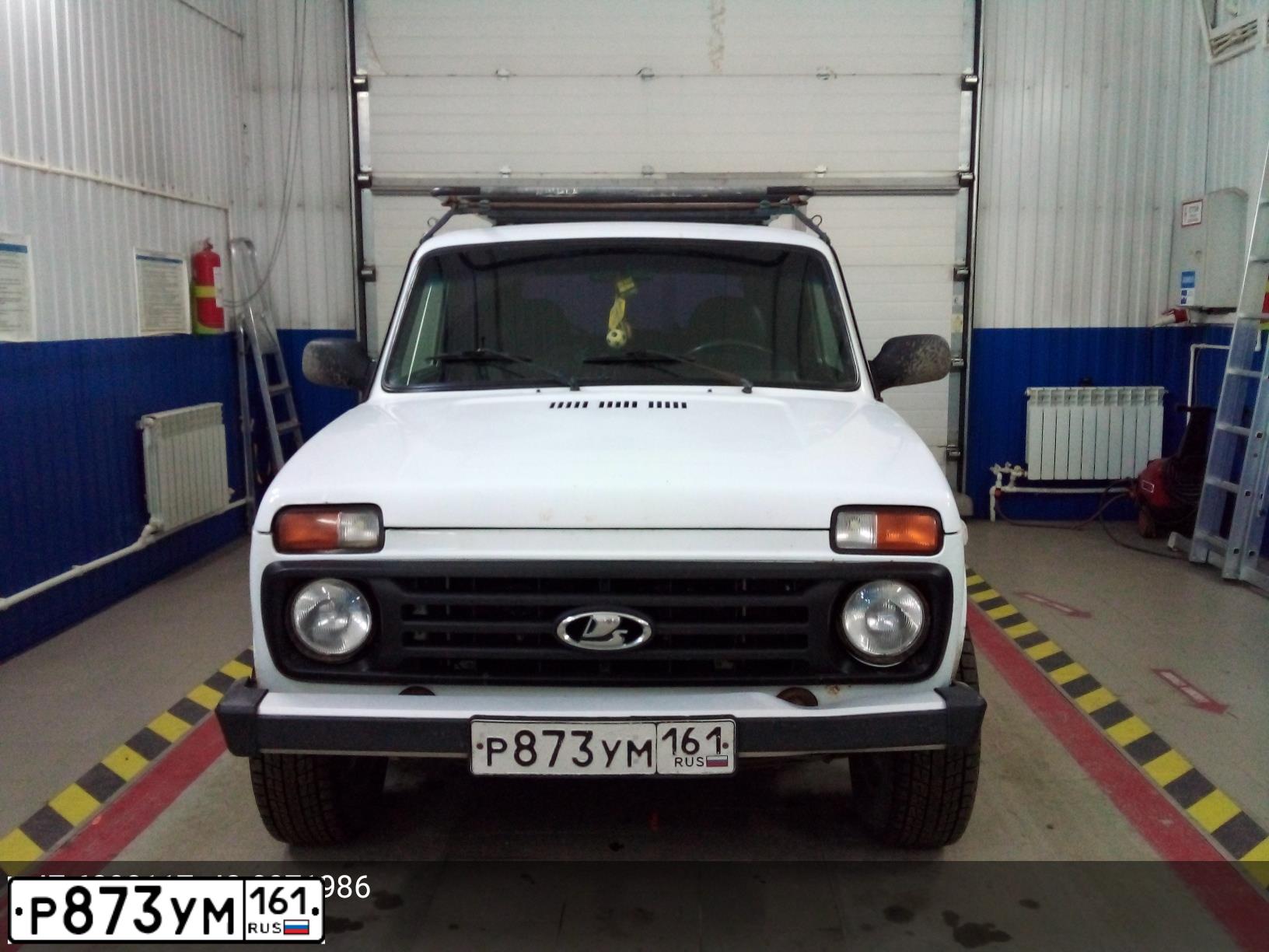 Фото автомобиля LADA 2121 NIVA, 2011 — госномер В055ВМ123. Цвет: ЯРКО - БЕЛЫЙ