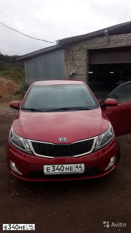 Фото автомобиля KIA RIO, 2012 — госномер Р189СА29. Цвет: Красный