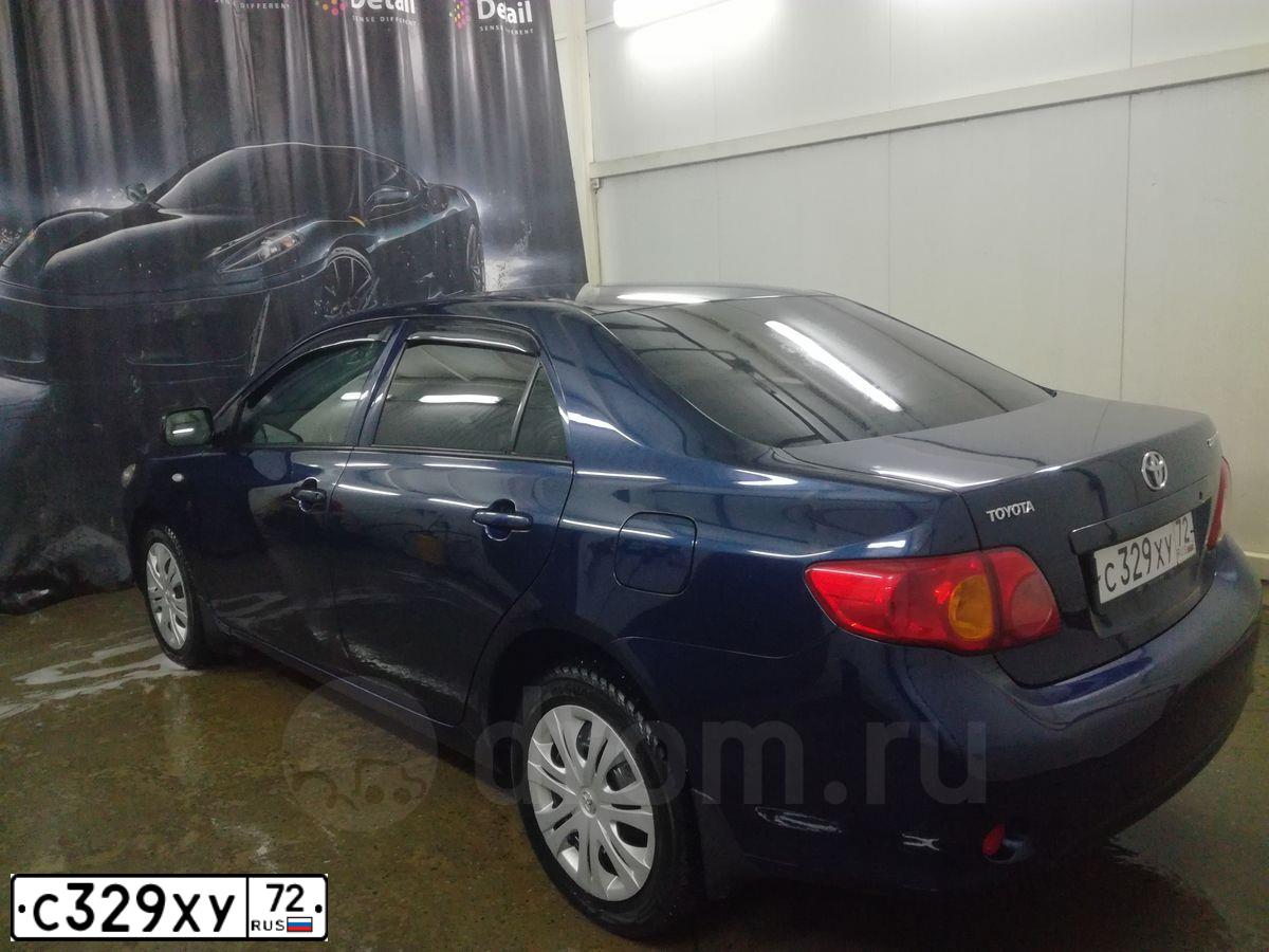 Фото автомобиля TOYOTA COROLLA, 2008 — госномер Е009НВ72. Цвет: синий