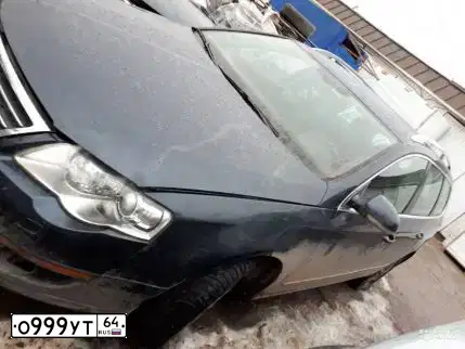 Фото автомобиля VOLKSWAGEN PASSAT, 2008 — госномер О999УТ64. Цвет: СЕРО СИНИЙ
