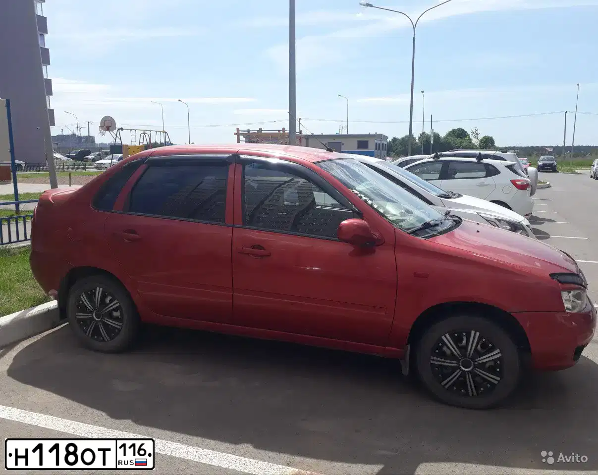 Фото автомобиля LADA 1118 KALINA, 2005 — госномер Е902ХТ12. Цвет: СЕРЕБРИСТО-КРАСНЫЙ