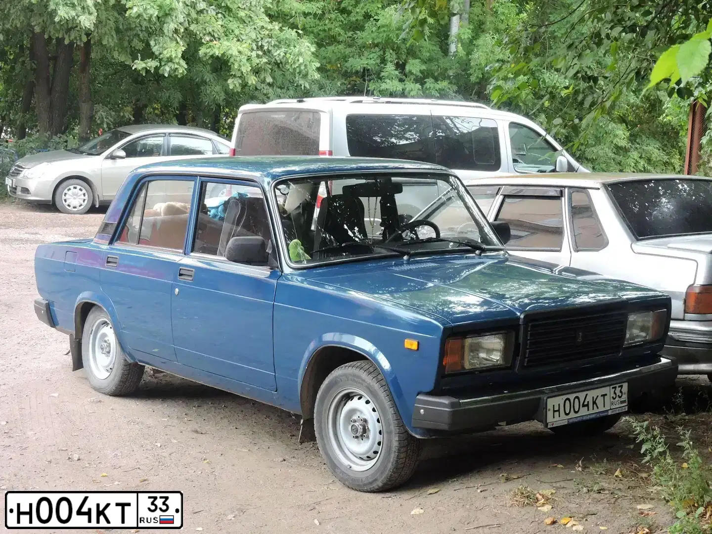 Фото автомобиля LADA 2107 LADA, 2009 — госномер Н004КТ33. Цвет: сине-зеленый