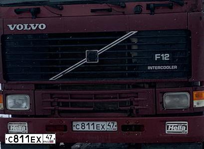 Фото автомобиля VOLVO VOLVO F12, 1993 — госномер С124НР03. Цвет: Красный