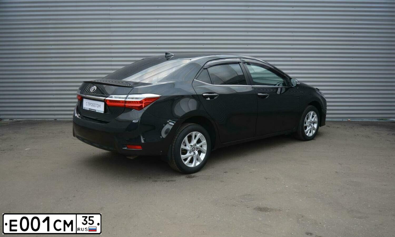 Фото автомобиля FORD FOCUS, 2007 — госномер Е001СМ35. Цвет: ВИШНЕВЫЙ
