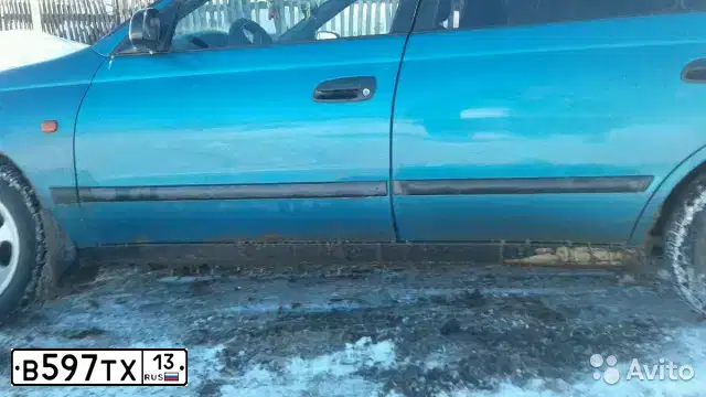 Фото автомобиля TOYOTA CARINA, 1998 — госномер К900РЕ99. Цвет: бирюзовый