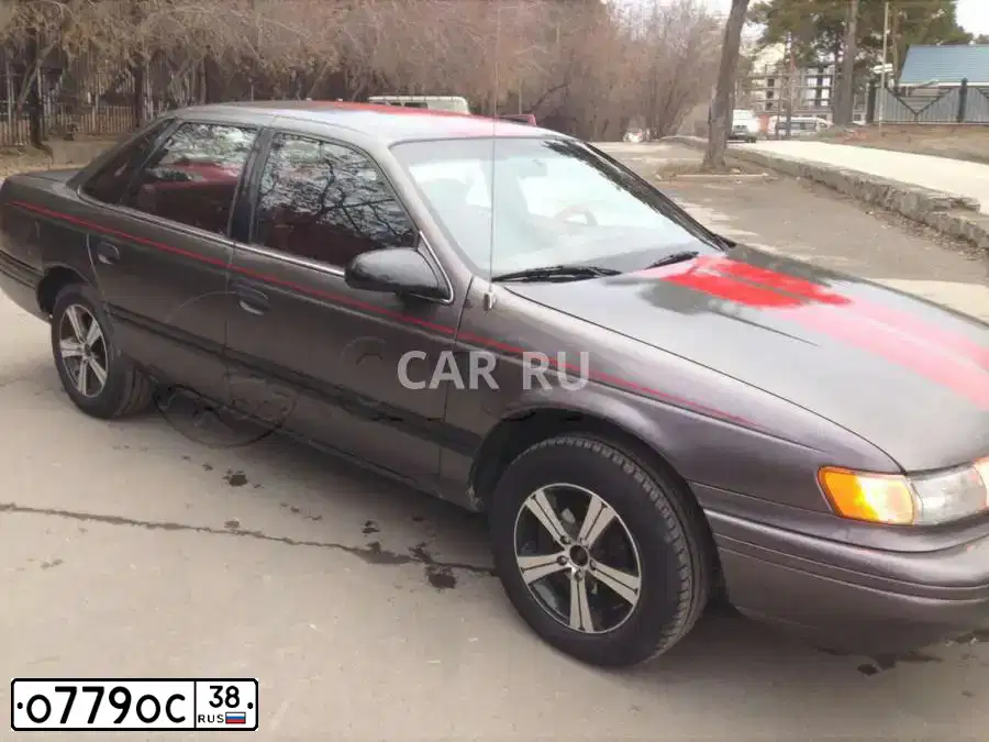 Фото автомобиля FORD TAURUS, 1992 — госномер К223ЕВ78