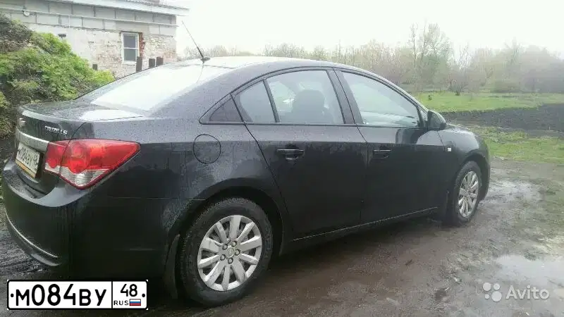 Фото автомобиля CHEVROLET CRUZE, 2012 — госномер М325ТР48. Цвет: ЧЕРНЫЙ МЕТАЛЛИК
