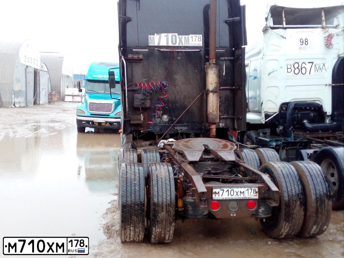 Фото автомобиля FREIGHTLINER COLUMBIA, 2000 — госномер М710ХМ178. Цвет: ЧЕРНЫЙ