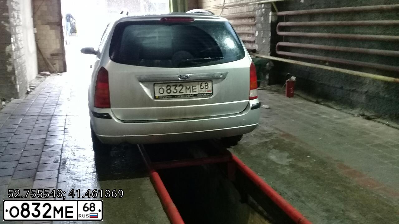 Фото автомобиля FORD D FOCUS, 2005 — госномер Р023КС68. Цвет: СВЕТЛО-СЕРЫЙ