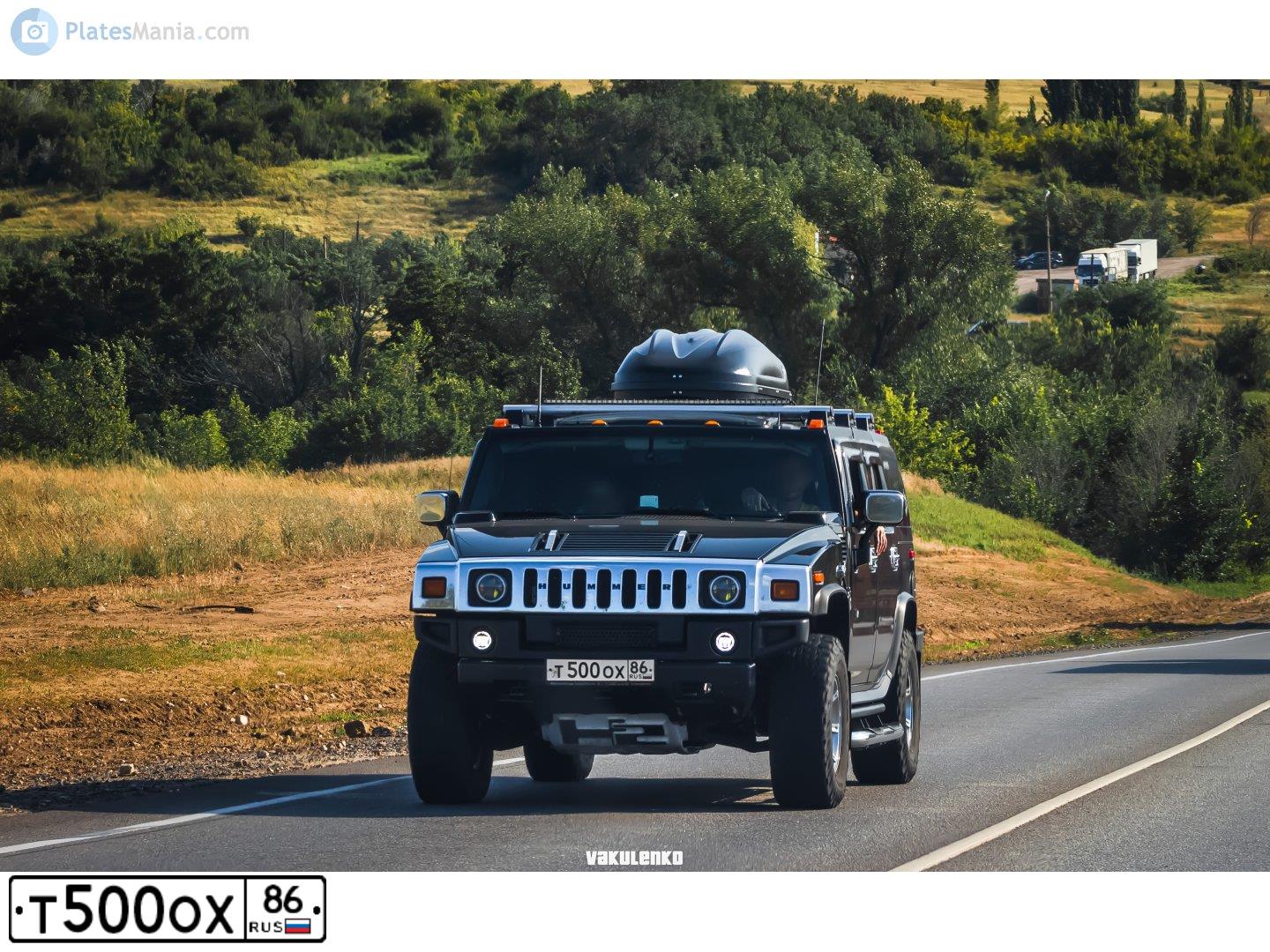 Фото автомобиля SSANGYONG MUSSO, 1997 — госномер Х455ВЕ186. Цвет: Темно-синий
