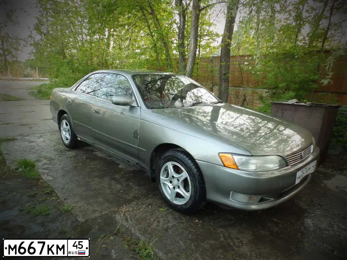 Фото автомобиля LADA 2107, 2003 — госномер М667КМ45. Цвет: СИНЕ-ЗЕЛЕНЫЙ