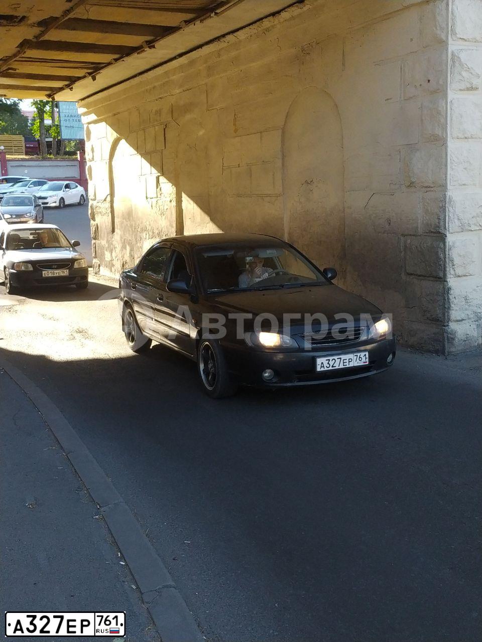 Фото автомобиля KIA SPECTRA, 2007 — госномер А327ЕР761. Цвет: ЧЕРНЫЙ