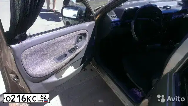 Фото автомобиля DAEWOO NEXIA, 2007 — госномер О216КС62. Цвет: ЖЕЛТЫЙ(ПЕСОЧНЫЙ)