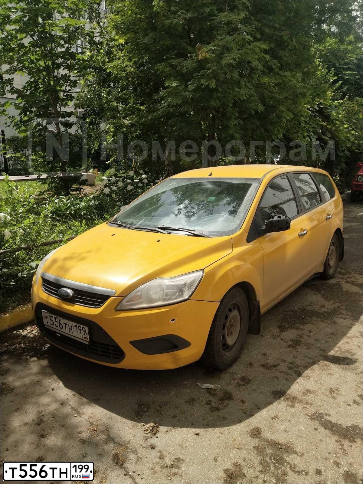 Фото автомобиля FORD FOCUS, 2008 — госномер Т556ТН199. Цвет: ЖЕЛТЫЙ