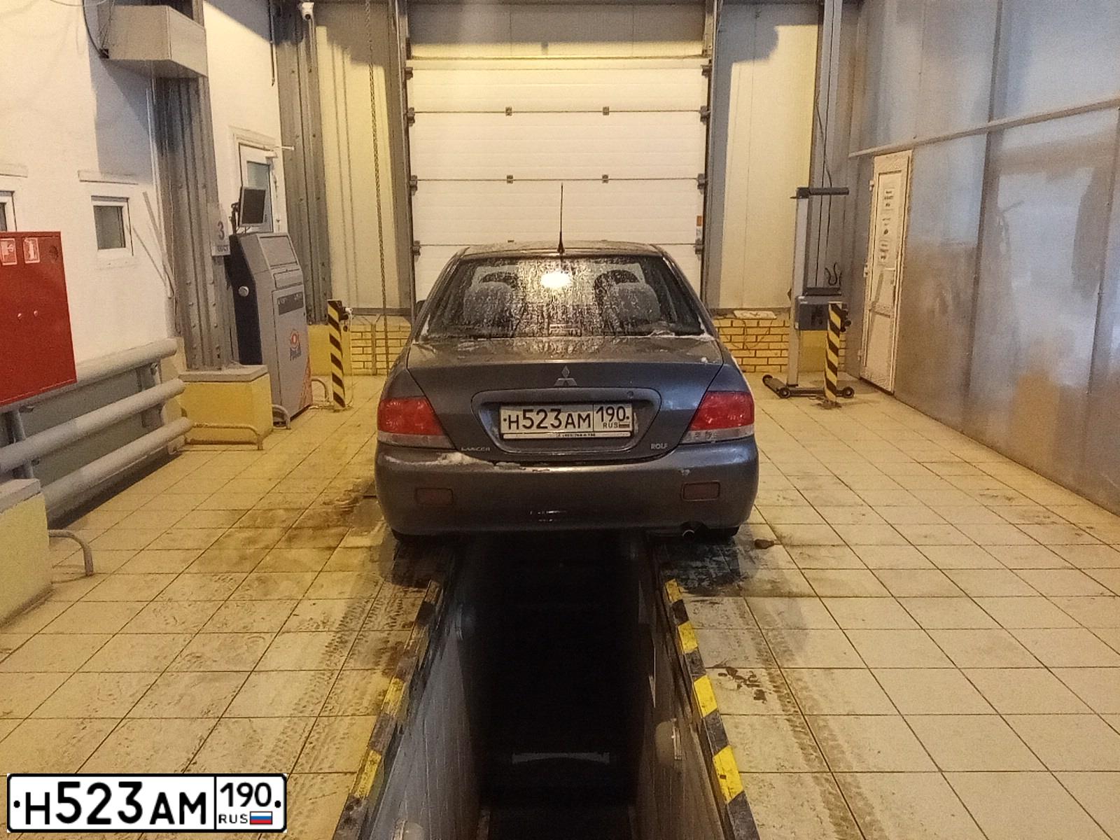 Фото автомобиля MITSUBISHI LANCER, 2009 — госномер С649ВС550. Цвет: СЕРЫЙ