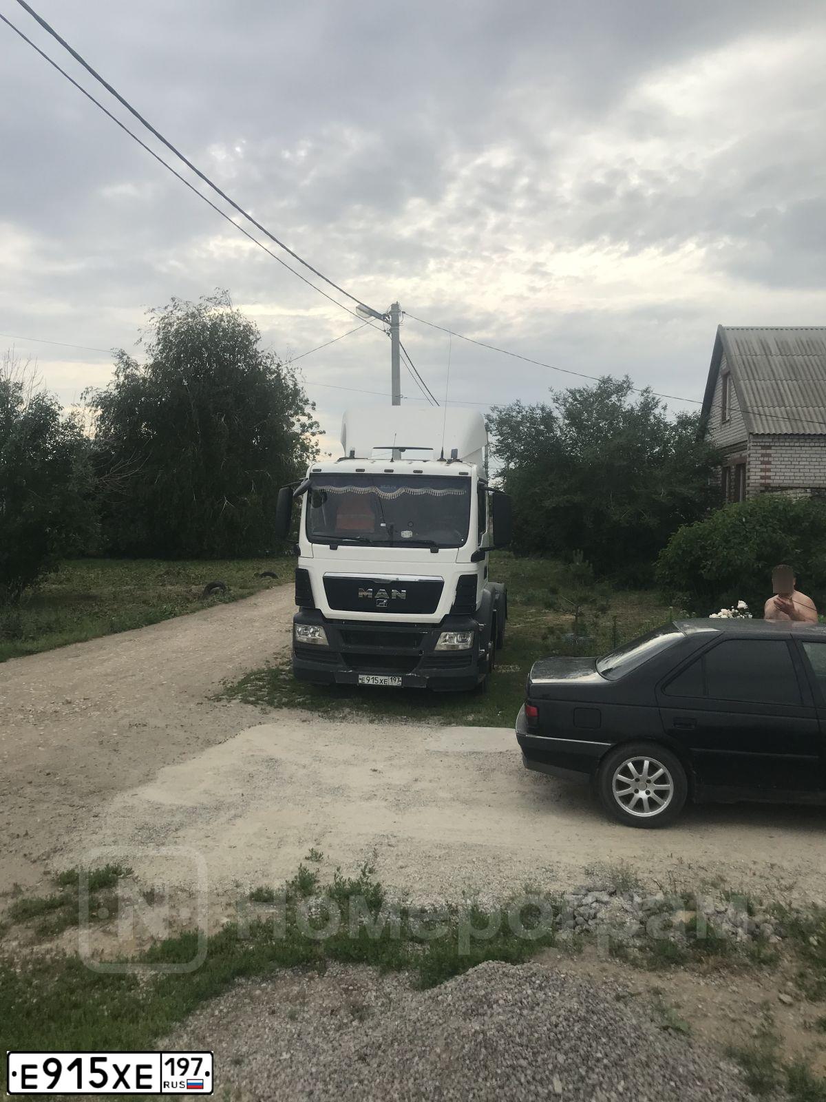 Фото автомобиля MAN TGS 19.XXX /4X2/, 2012 — госномер Е915ХЕ197. Цвет: БЕЛЫЙ