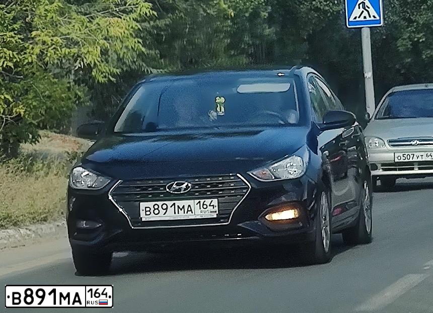 Фото автомобиля HYUNDAI SOLARIS, 2018 — госномер В891МА164. Цвет: ЧЕРНЫЙ