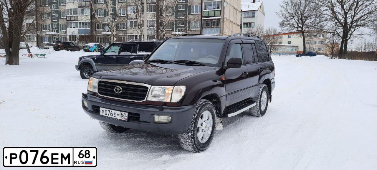 Фото автомобиля ТОЙОТА ЛЕНД КРУЗЕР 100, 2000 — госномер Р076ЕМ68. Цвет: ВИШНЕВЫЙ