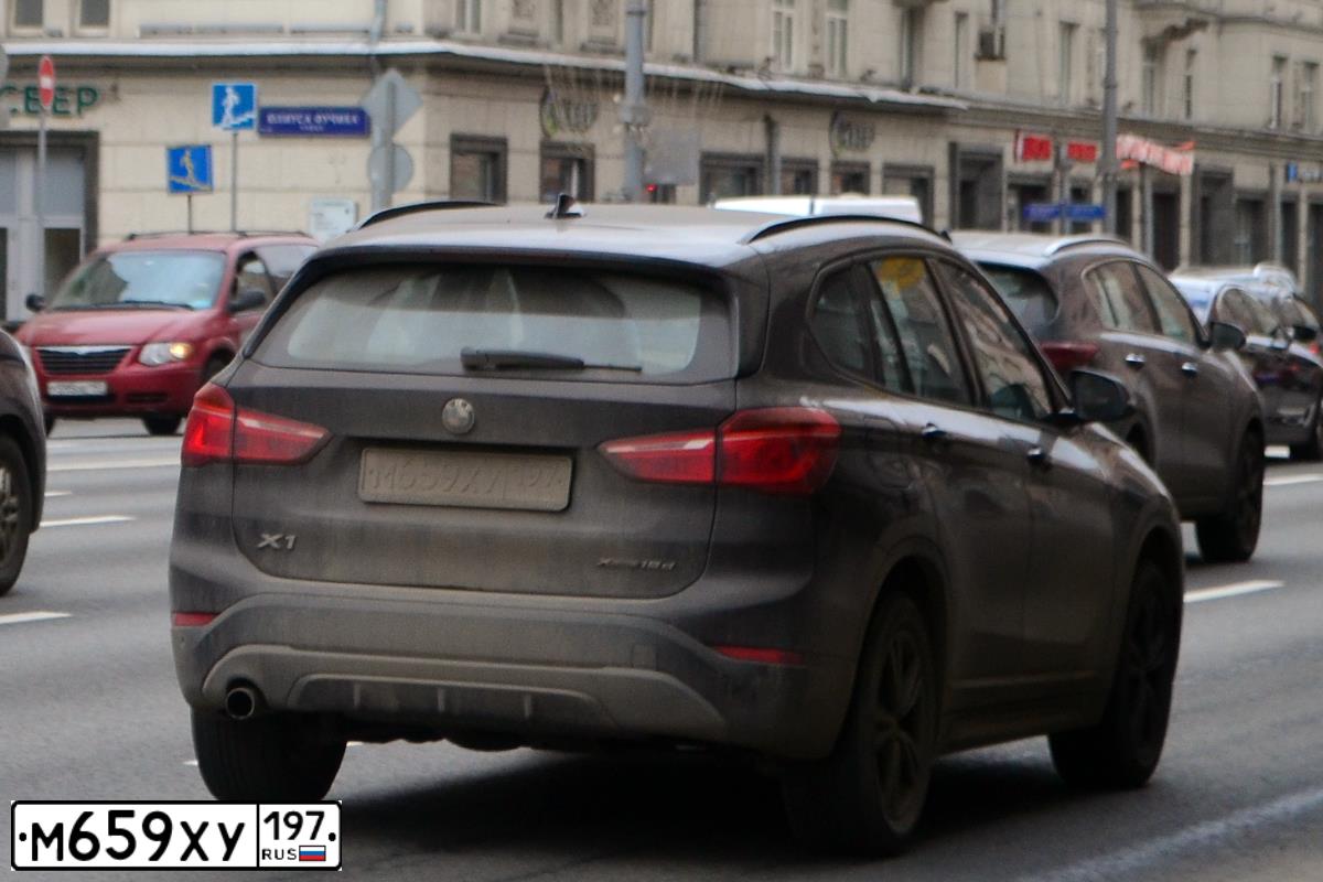 Фото автомобиля BMW X1, 2019 — госномер М314ТХ790. Цвет: Коричневый