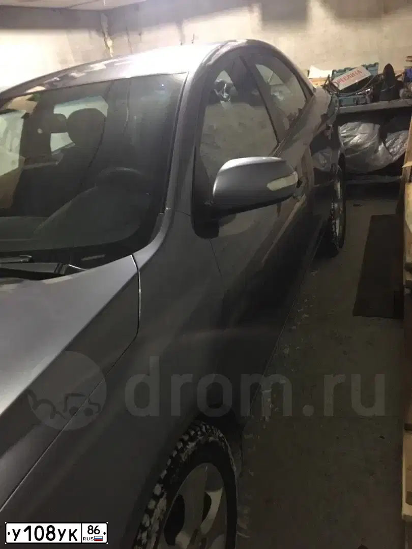 Фото автомобиля KIA CERATO, 2010 — госномер А660УВ186. Цвет: СВЕТЛО-СЕРЫЙ