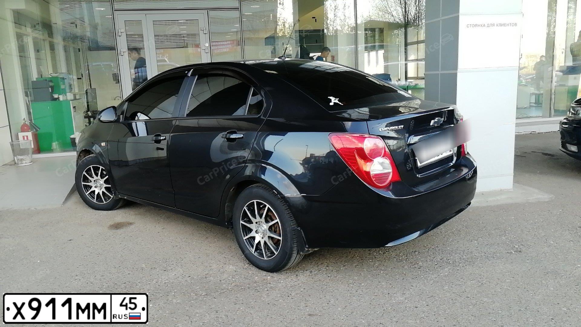 Фото автомобиля CHEVROLET T AVEO, 2012 — госномер У121ТК72. Цвет: ЧЕРНЫЙ