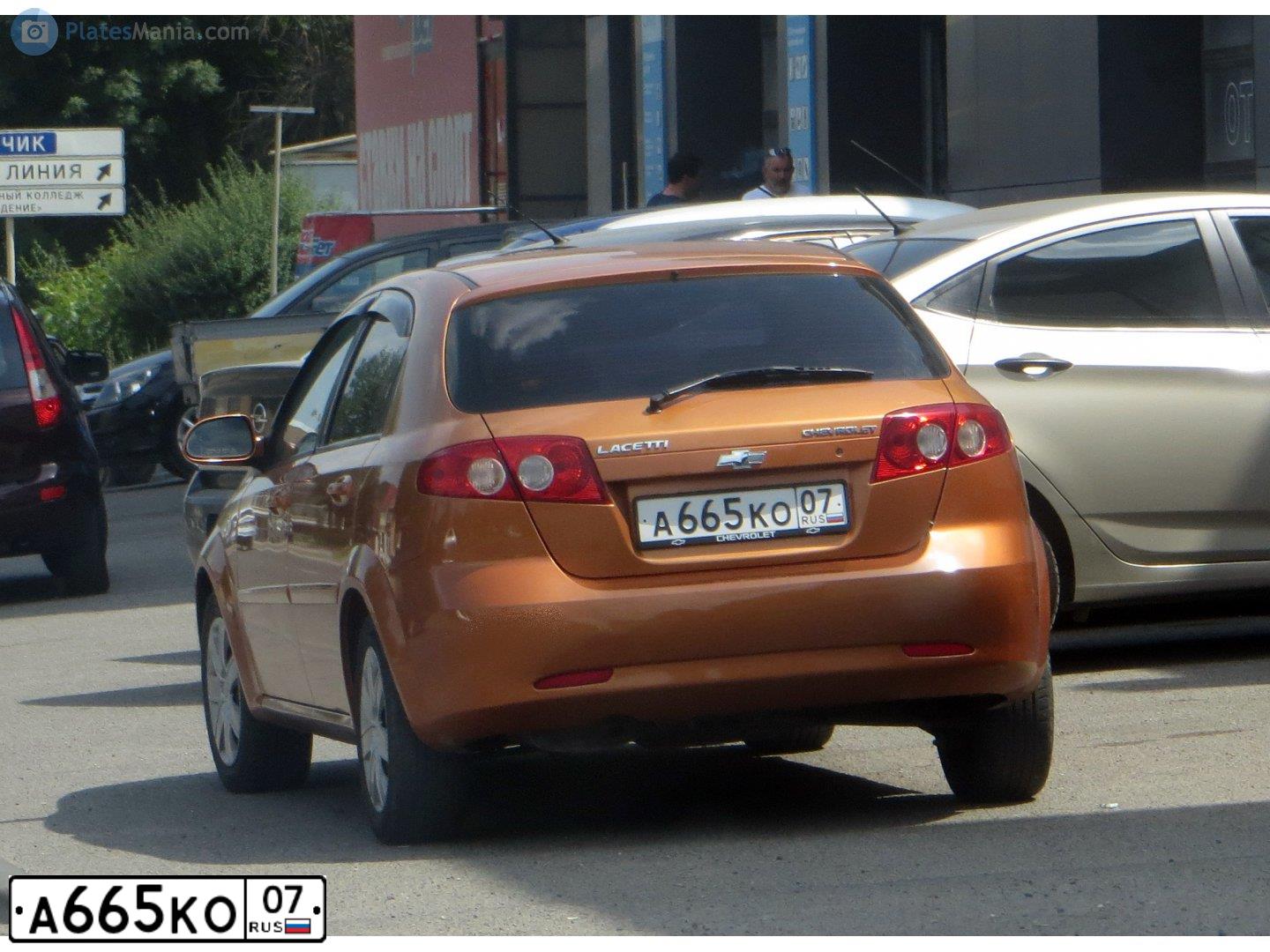 Фото автомобиля LADA 2170 PRIORA, 2015 — госномер В001ОО15. Цвет: ЧЕРНЫЙ