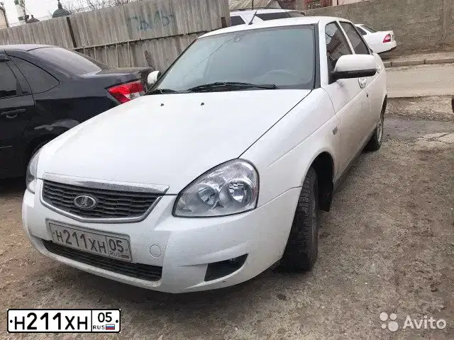 Фото автомобиля LADA PRIORA, 2015 — госномер Х067ТМ05. Цвет: Белый