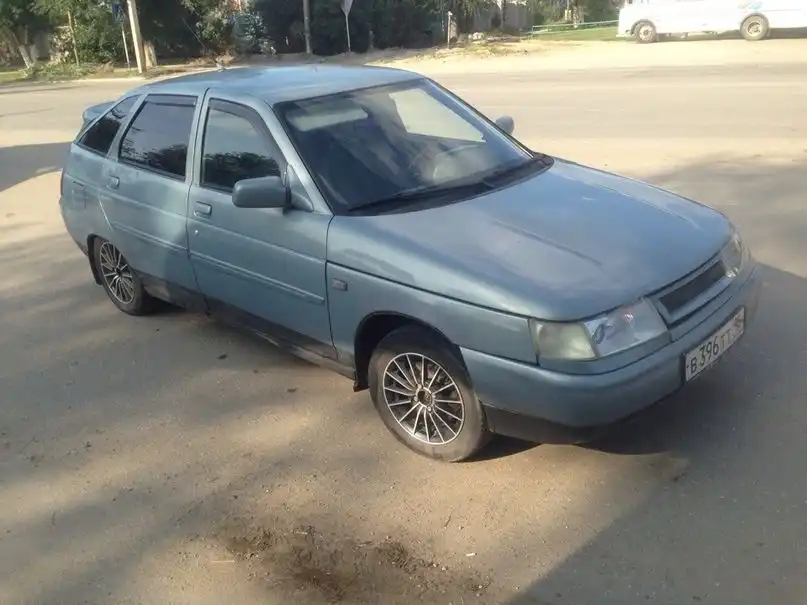 Фото автомобиля LADA 2109 SAMARA, 2001 — госномер В396ТТ95. Цвет: СЕРЕБРИСТО-ЖЕЛТО-ЗЕЛ