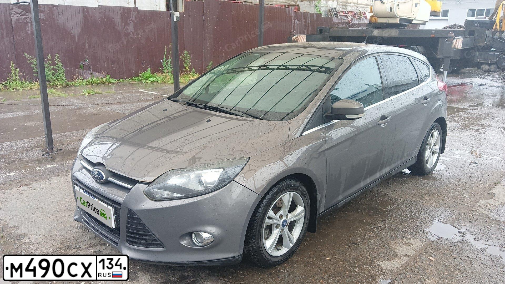 Фото автомобиля FORD FOCUS, 2012 — госномер М490СХ134. Цвет: СЕРО-КОРИЧНЕВЫЙ