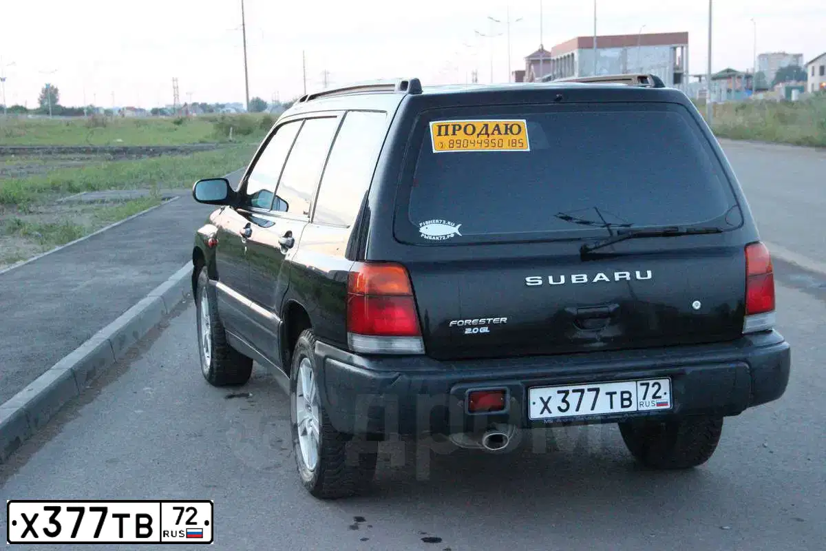 Фото автомобиля SUBARU FORESTER, 1998 — госномер Н101ХО72. Цвет: ЧЕРНЫЙ