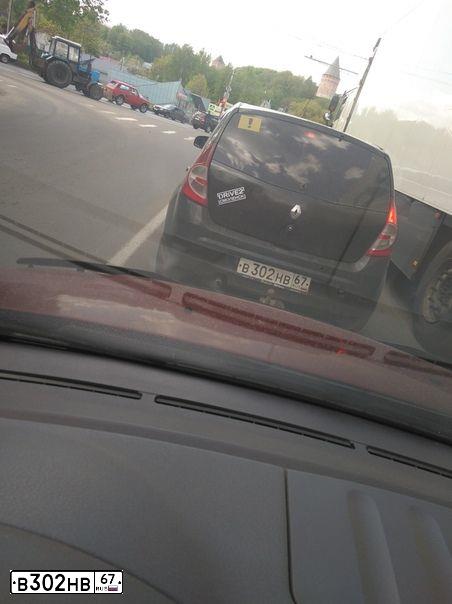 Фото автомобиля RENAULT SANDERO, 2011 — госномер В302НВ67. Цвет: ЧЕРНЫЙ