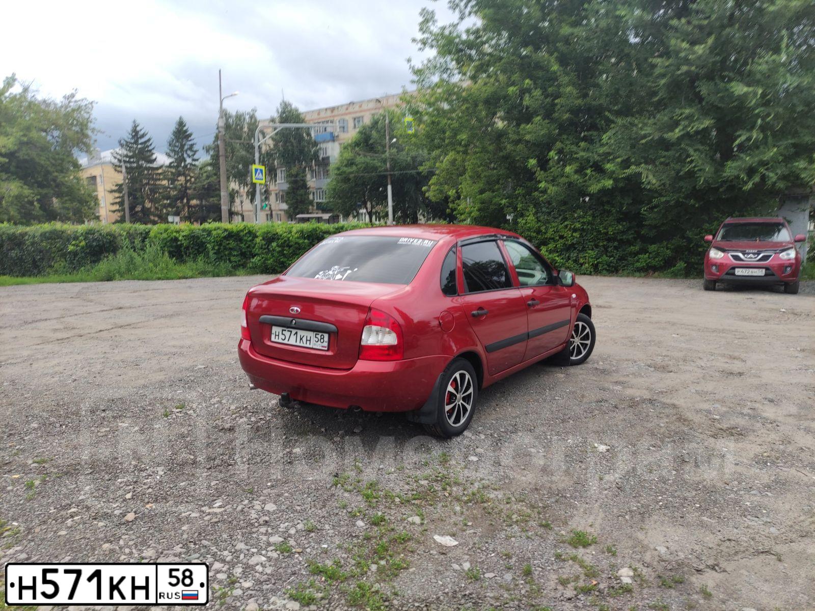 Фото автомобиля LADA 1118 KALINA, 2010 — госномер Н571КН58. Цвет: СЕРЕБРИСТО-КРАСНЫЙ