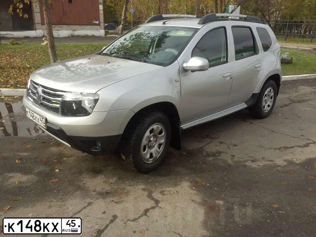 Фото автомобиля RENAULT DUSTER, 2013 — госномер М666НН72. Цвет: СВЕТЛО-СЕРЫЙ