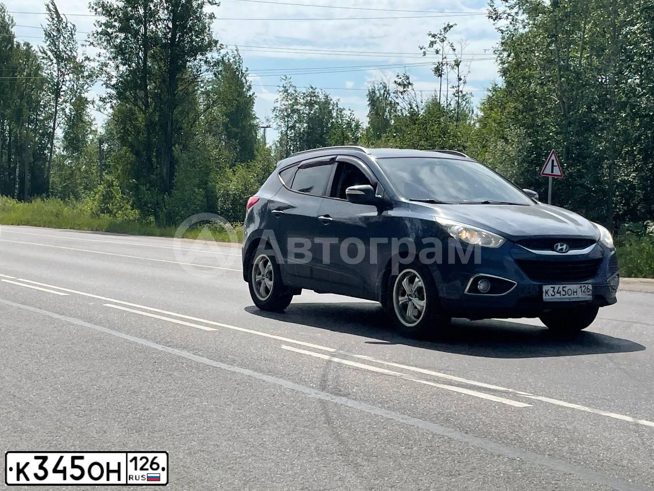 Фото автомобиля HYUNDAI IX35, 2010 — госномер Т686АТ47. Цвет: ТЕМНО-СИНИЙ