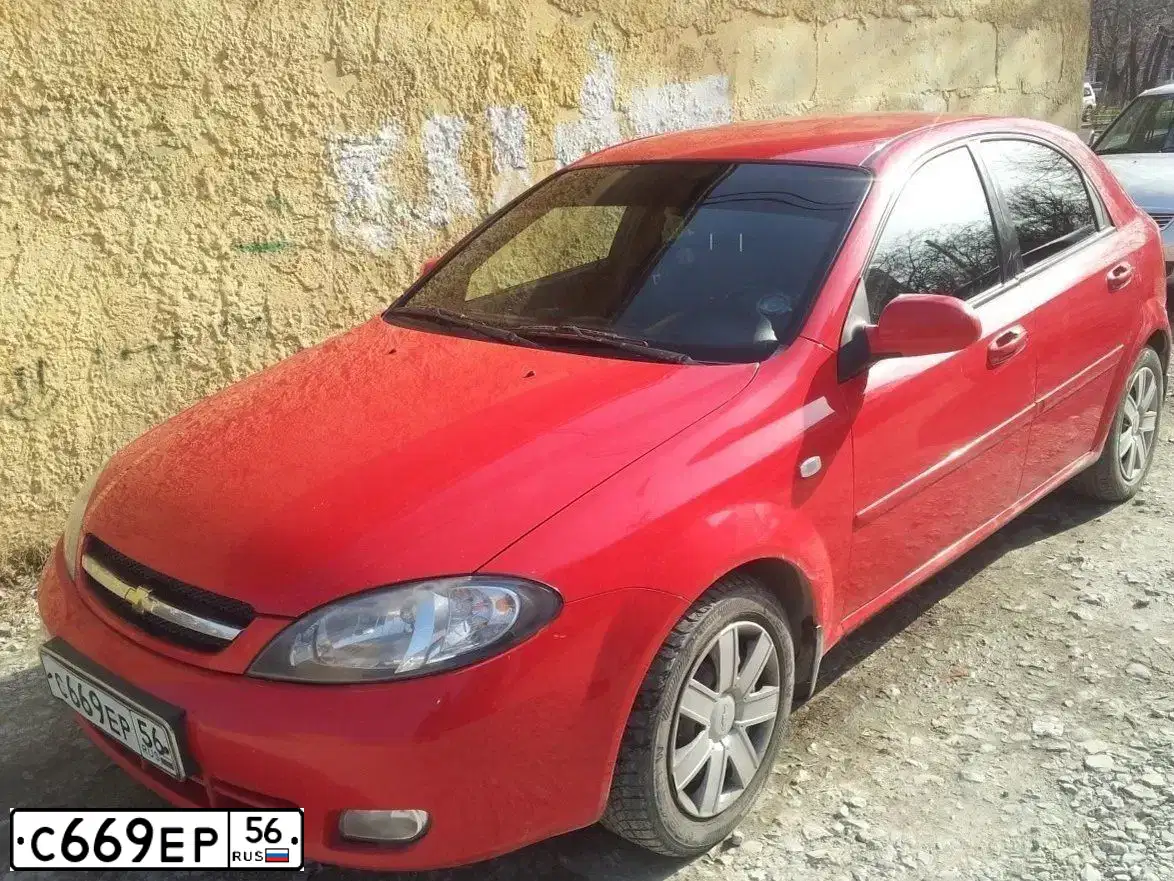 Фото автомобиля CHEVROLET LACETTI, 2007 — госномер Х139МЕ763. Цвет: КРАСНЫЙ
