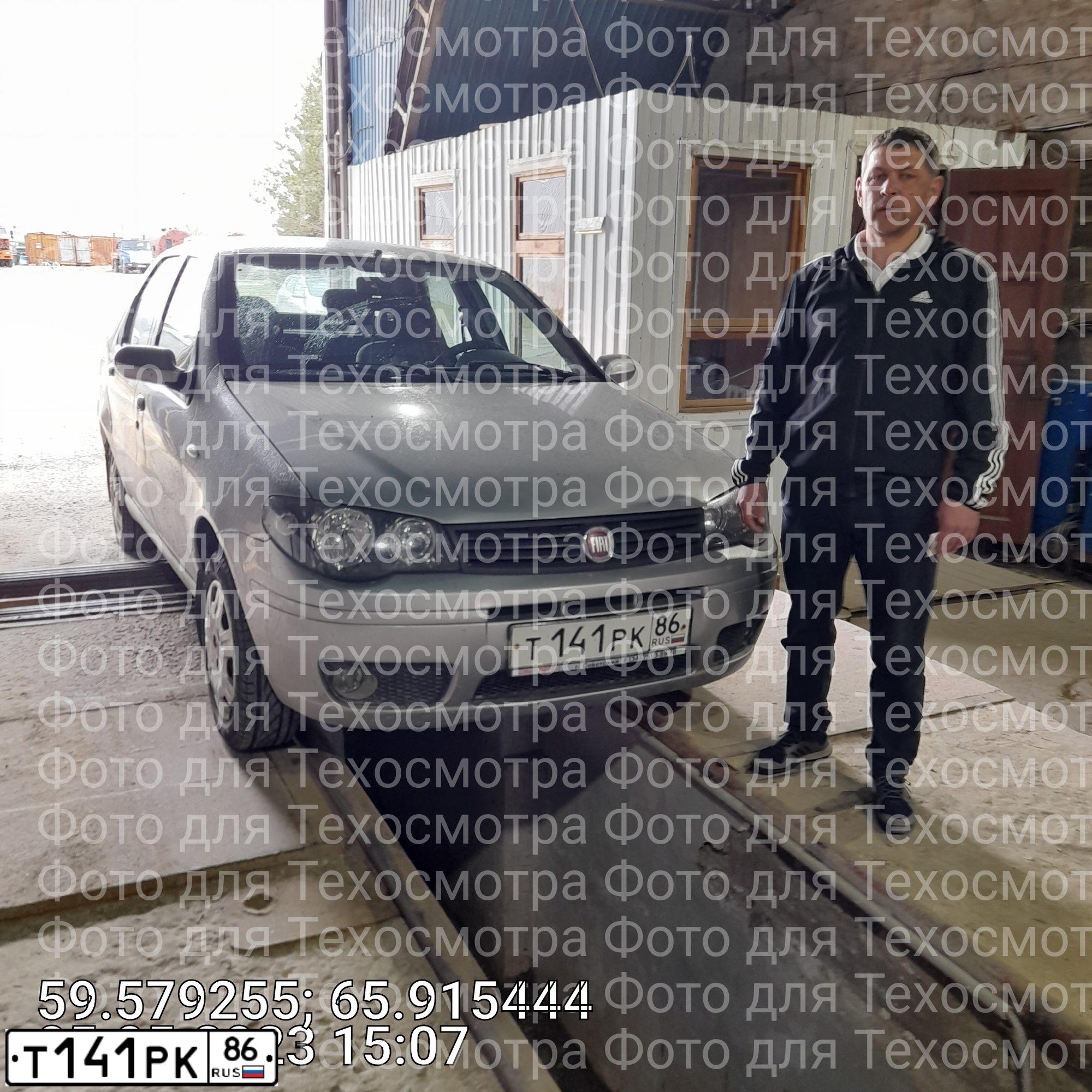 Фото автомобиля FIAT ALBEA, 2012 — госномер Т141РК86. Цвет: СЕРЫЙ СТАЛЬНОЙ