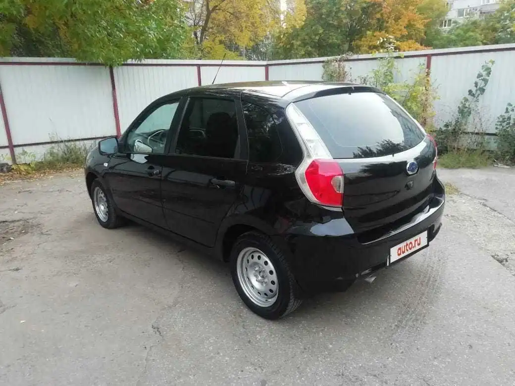 Фото автомобиля DATSUN MI-DO, 2015 — госномер Р285КР58. Цвет: ЧЕРНЫЙ